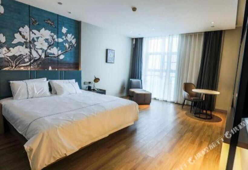 Magnotel Tongxiang Shimao Center