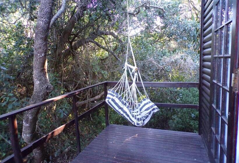 فندق صغير Woodlands Cottages & Camping