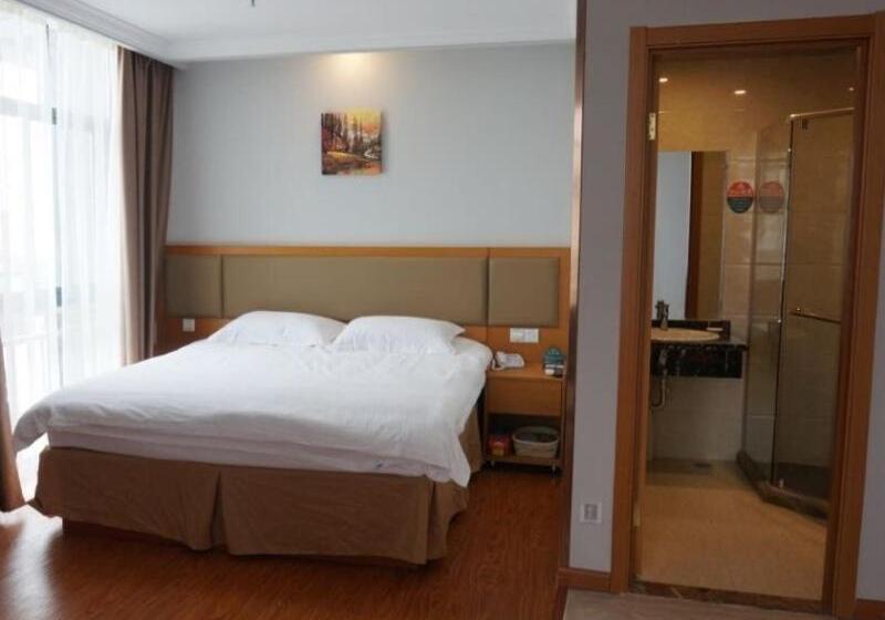 בית מלון כפרי Greentree Inn Henan Xinyang Shangcheng County Huangbaishan Road Times Shopping Mall Express