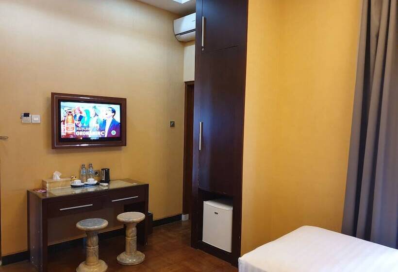 Отель Omah Qu Guesthouse Malioboro