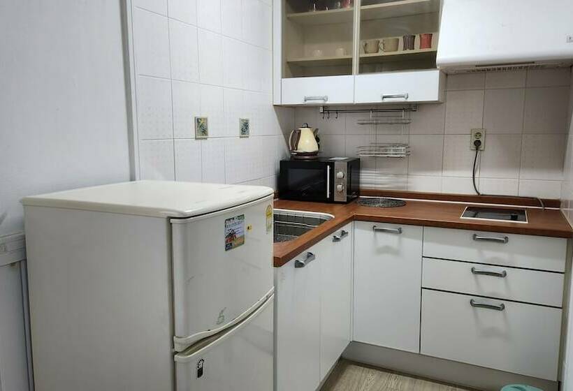 בית מלון כפרי Queens Bay Pension