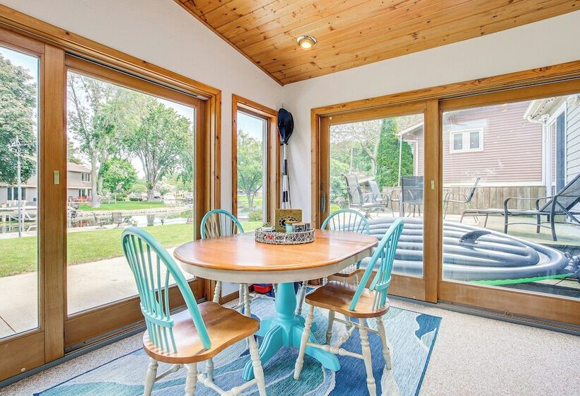 Oshkosh Canal Front Home W/ Sunroom & Watercraft!