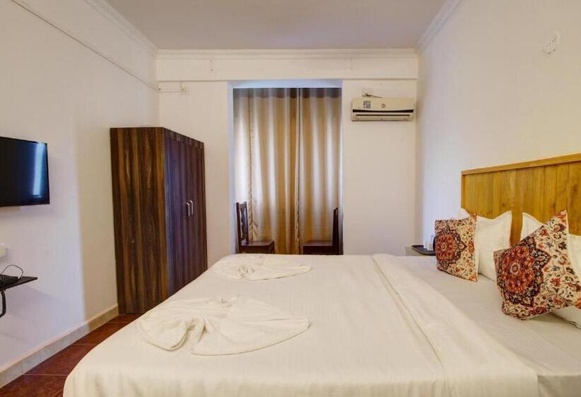 Hotelli Pleasure Inn Near Turtle Beach Morjim Manage By Ld Group Of Hospitality