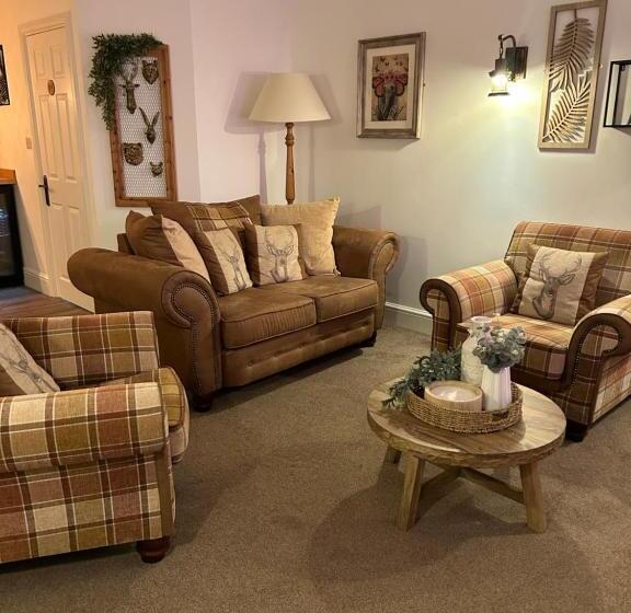 بنسيون The Coachmans Cottage