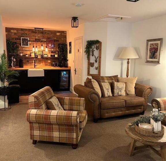 بنسيون The Coachmans Cottage