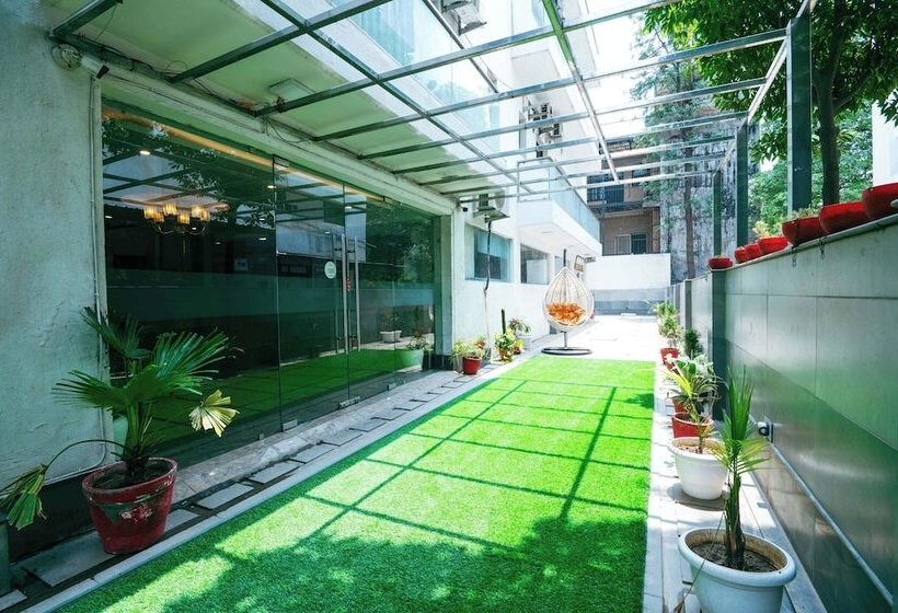 בית מלון כפרי Treebo Sunny Feast