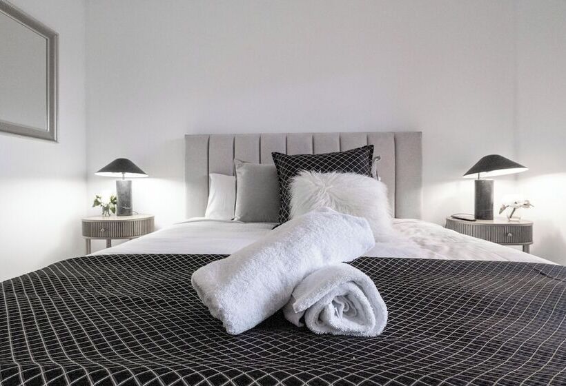 Apartments By The International