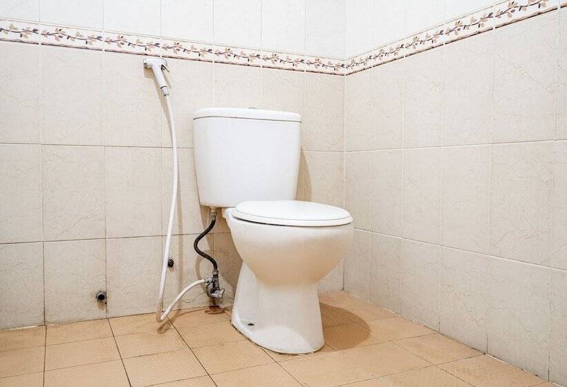 Capital O Hotel Abadi