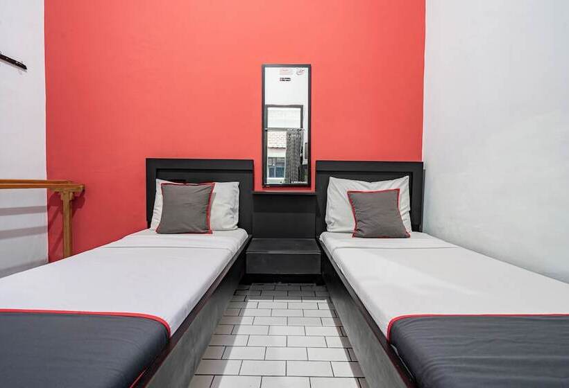 Capital O Hotel Abadi