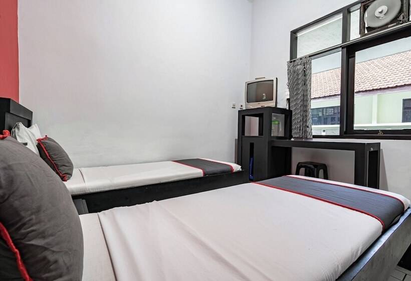 Capital O Hotel Abadi