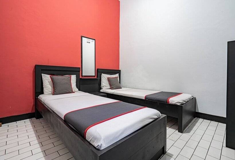 Capital O Hotel Abadi