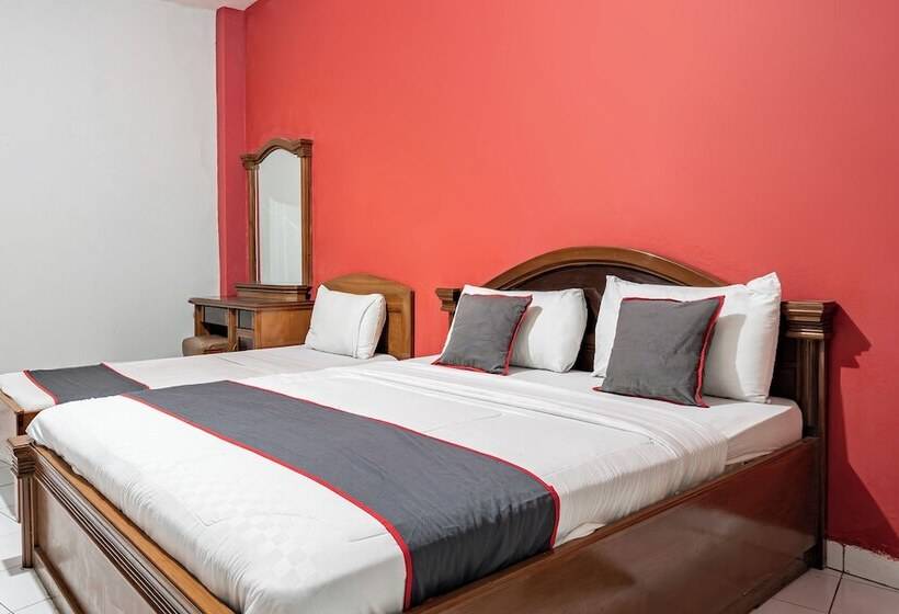 Capital O Hotel Abadi