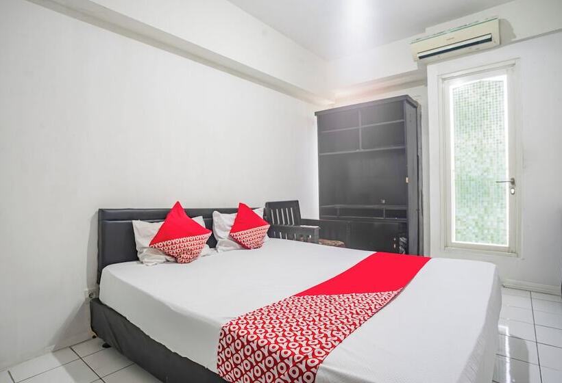 ホテル Oyo 94083 Apartemen Podomoro Golf View Victory Rooms