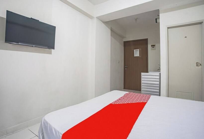 ホテル Oyo 94083 Apartemen Podomoro Golf View Victory Rooms