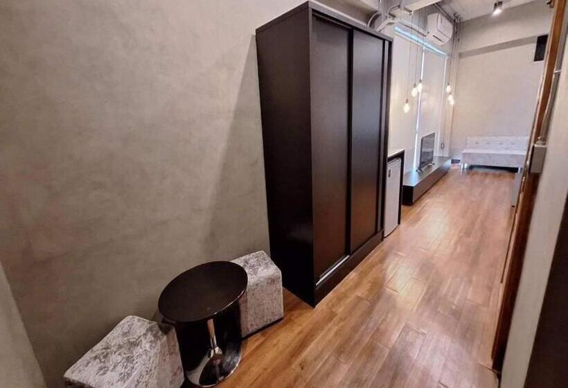 Отель Capital O 75512 Loft Residence  Suphanburi