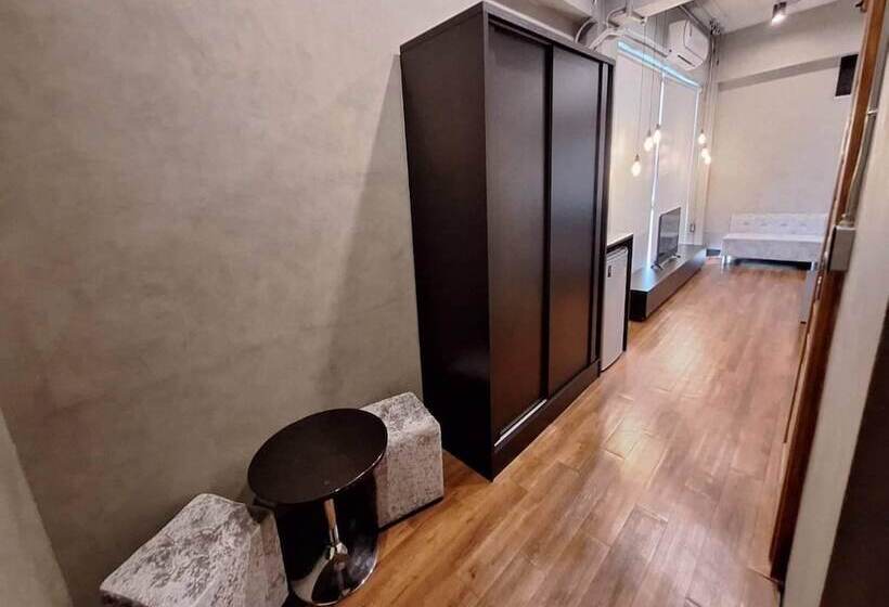 Отель Capital O 75512 Loft Residence  Suphanburi