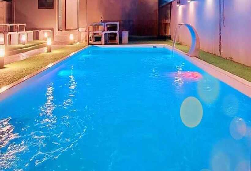 Отель Capital O 75512 Loft Residence  Suphanburi