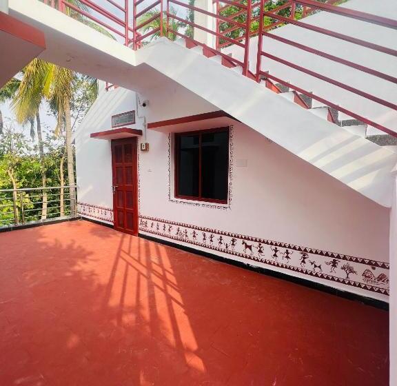 בית מלון כפרי Tranquil Mango Meadows Hampi