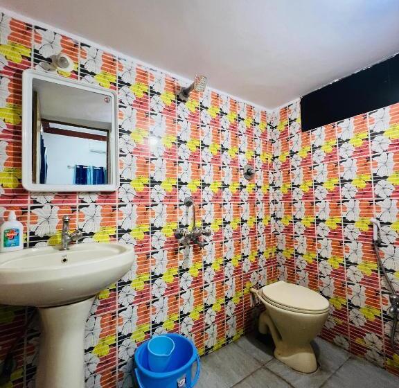 בית מלון כפרי Tranquil Mango Meadows Hampi