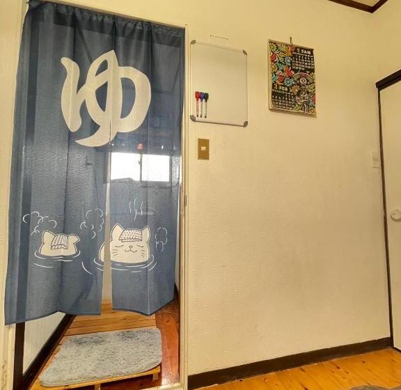 پانسیون 与論ゲストハウス ズッ友荘