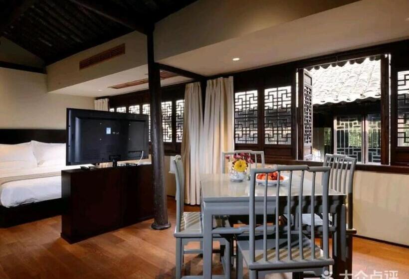 ホテル Blossom House Zhouzhuang Jixiang Yard