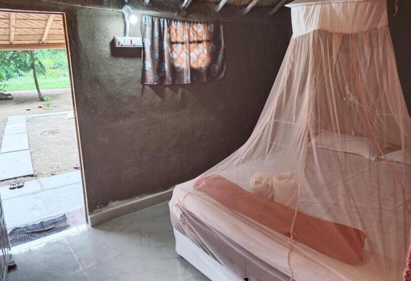 בית מלון כפרי Hampi Waterfall Cottages