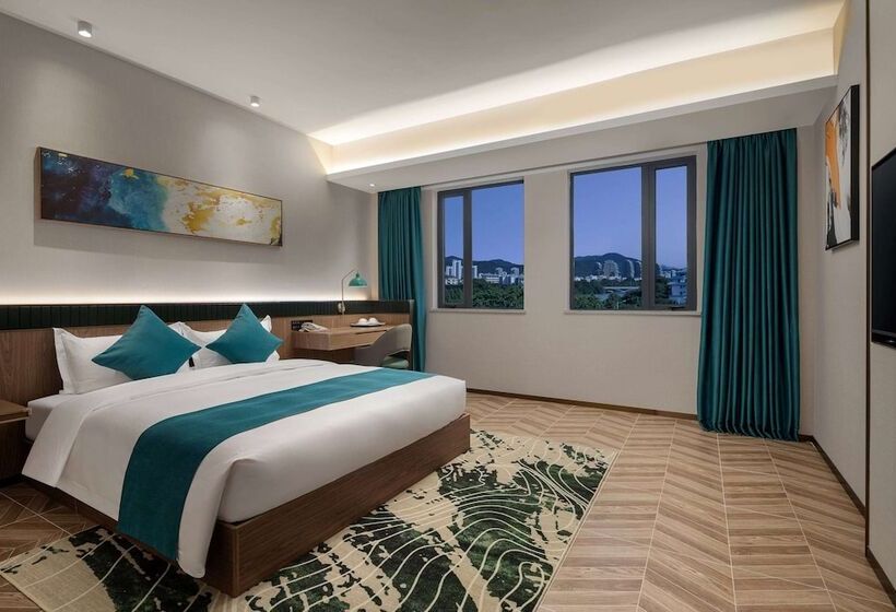 בית מלון כפרי Days Inn By Wyndham Hainan Sanya Bay