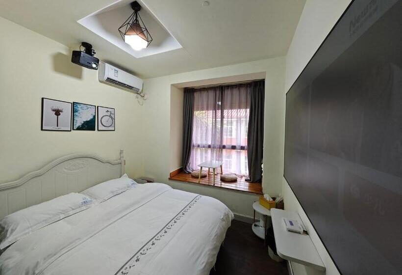 بنسيون 海口水慕青华客栈海南大学店