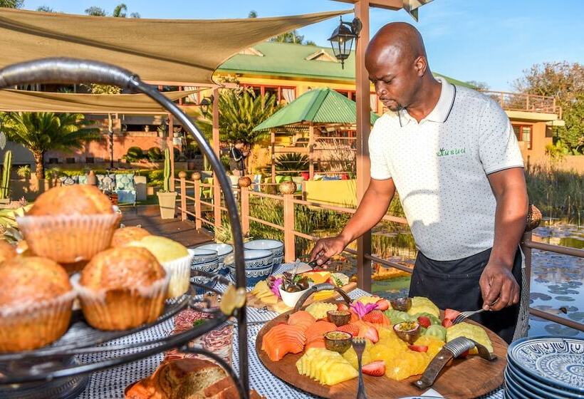 בית מלון כפרי Bambuu Lakeside Lodge