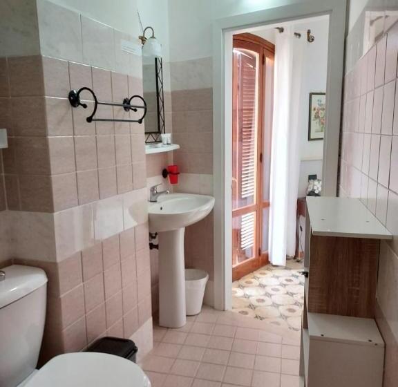 בית מלון כפרי Arenella Beach Rooms