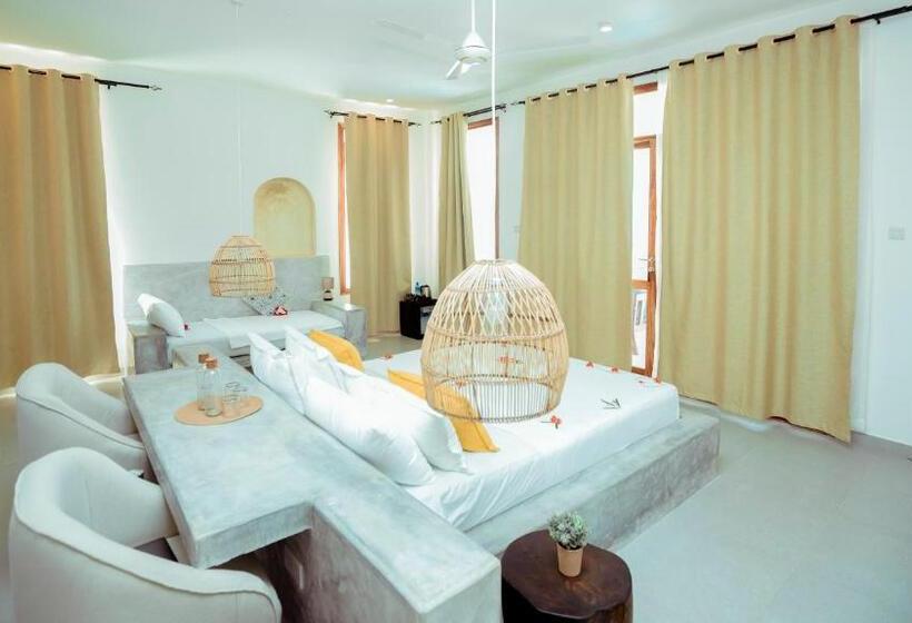 בית מלון כפרי Mnana Beach Bungalows