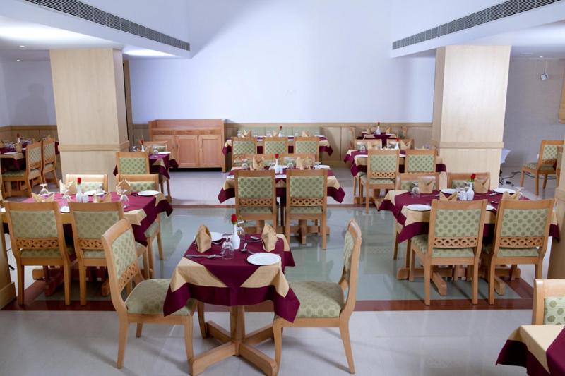 فندق Pooram International