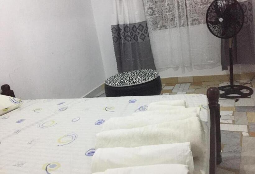 Пансион Comfy Beachside Condo