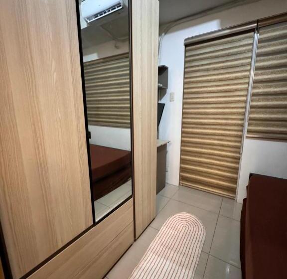 هتل Estaycation Condo Suites