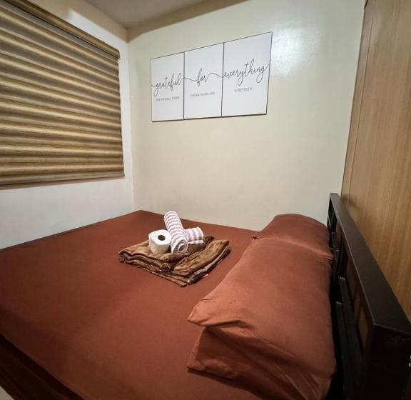 هتل Estaycation Condo Suites