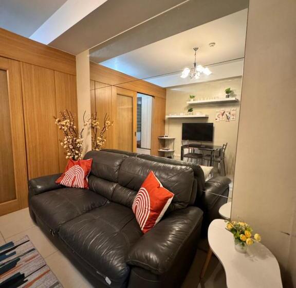 هتل Estaycation Condo Suites