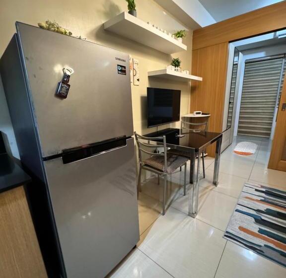 هتل Estaycation Condo Suites