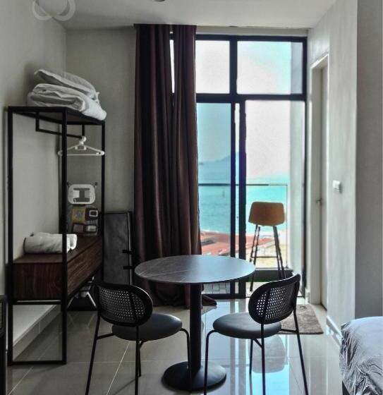 Studio Room With Balcony Seaview At The Shore Kk By Clover Home