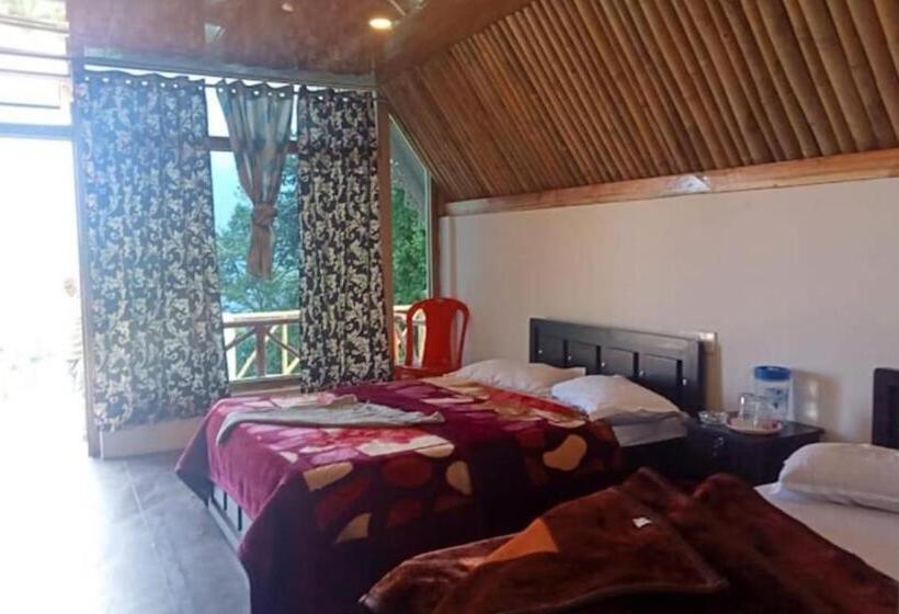 ホテル Amar Bari Happy Valley Cottages By Stayapart