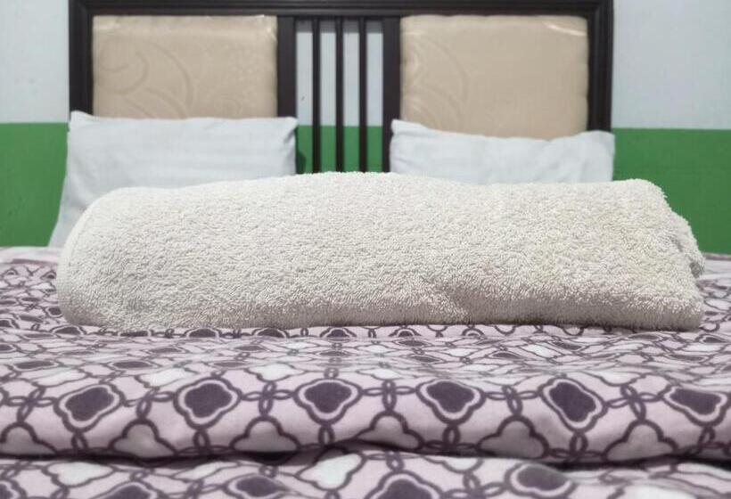 Отель Puspa Tiara Syar I Guci Mitra Reddoorz