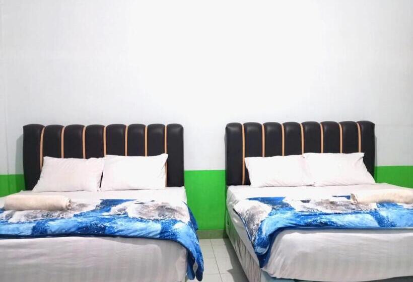 Отель Puspa Tiara Syar I Guci Mitra Reddoorz