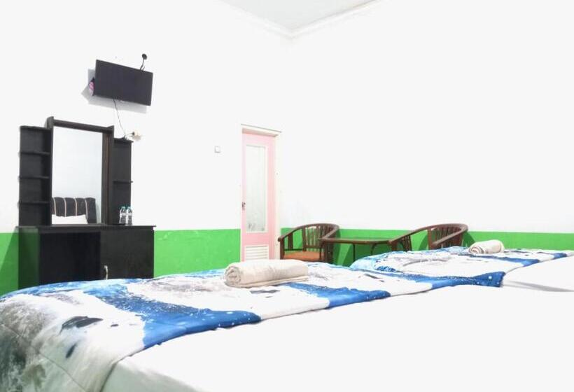 Отель Puspa Tiara Syar I Guci Mitra Reddoorz