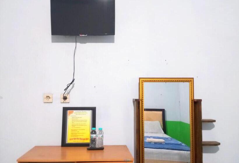 Отель Puspa Tiara Syar I Guci Mitra Reddoorz