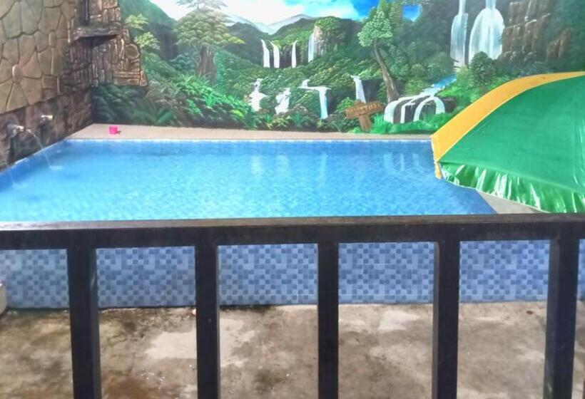 Отель Puspa Tiara Syar I Guci Mitra Reddoorz