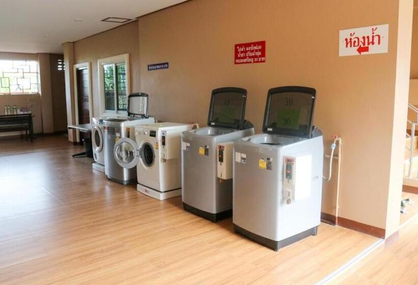 ホテル Capital O 75521 Sang Siri Apartment