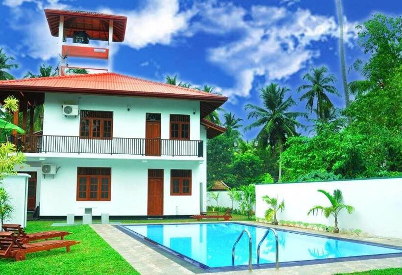 Отель Paradise Stays Bentota