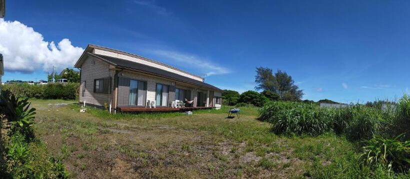 Пансион 奄美ゲストハウス宇宿サンライズビーチ