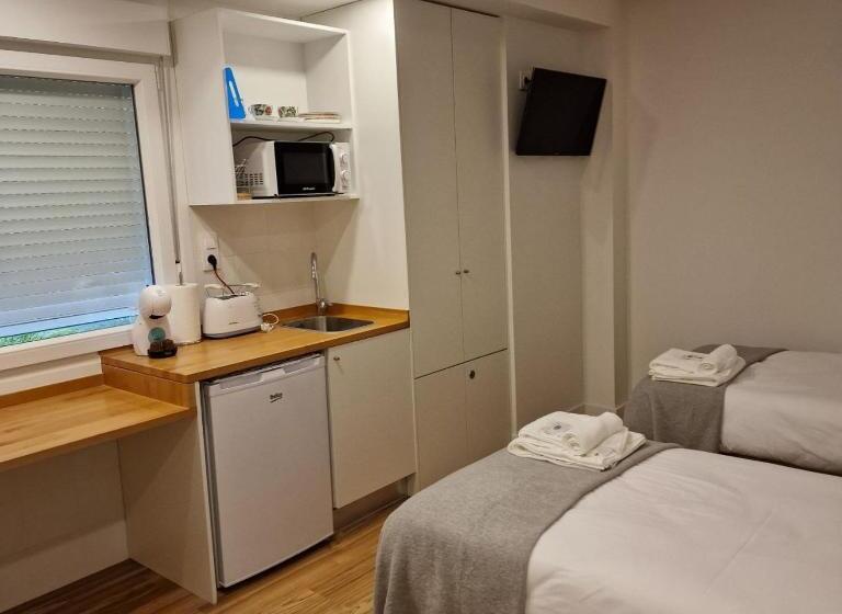 펜션 Alojamientos Cando