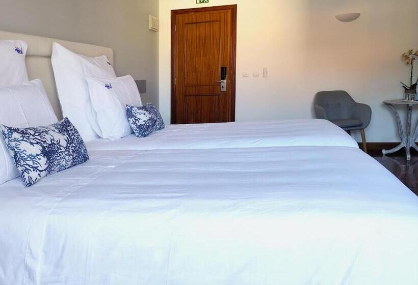 호텔 Luso Village Boutique