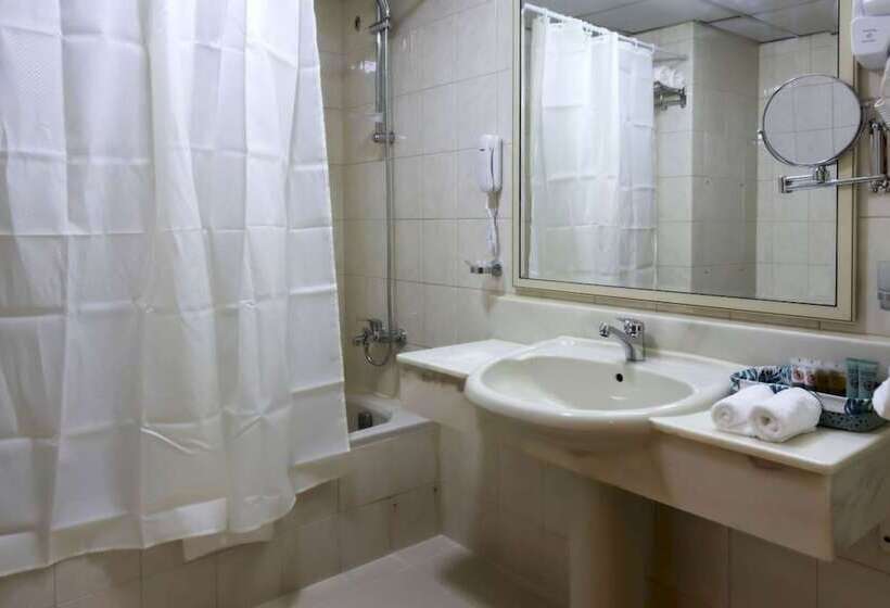 هتل Capital O 126 Manama Tower